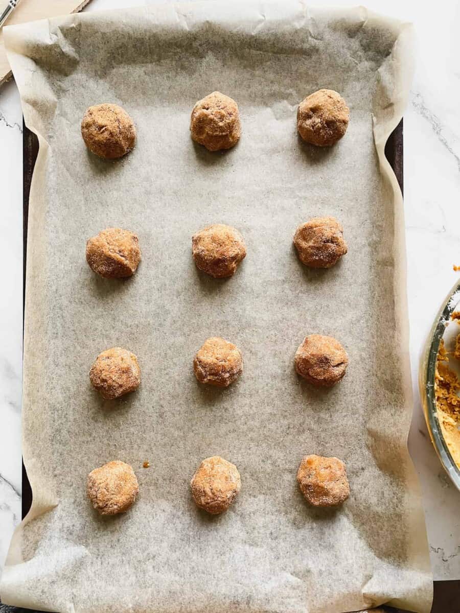 Overhead of Pumpkin Biscoff Cookies on baking sheet before baking
