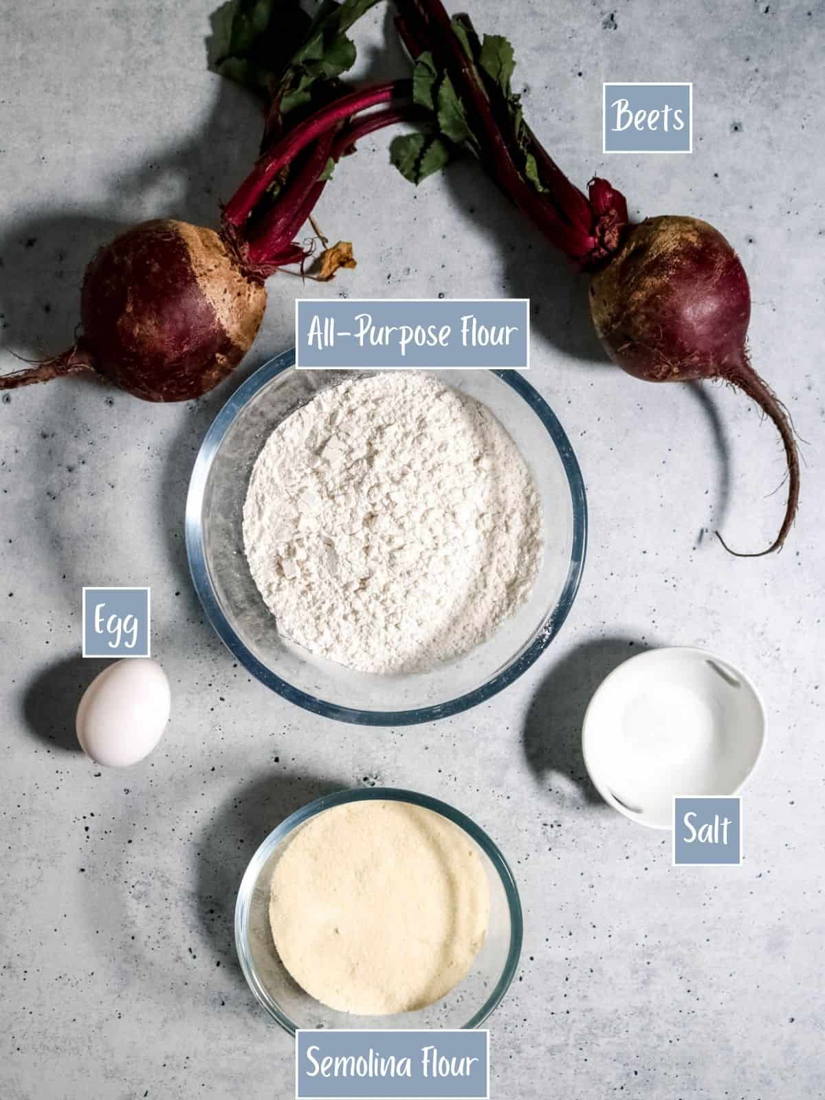 Labeled photo of the ingredients to make beetroot ravioli dough.