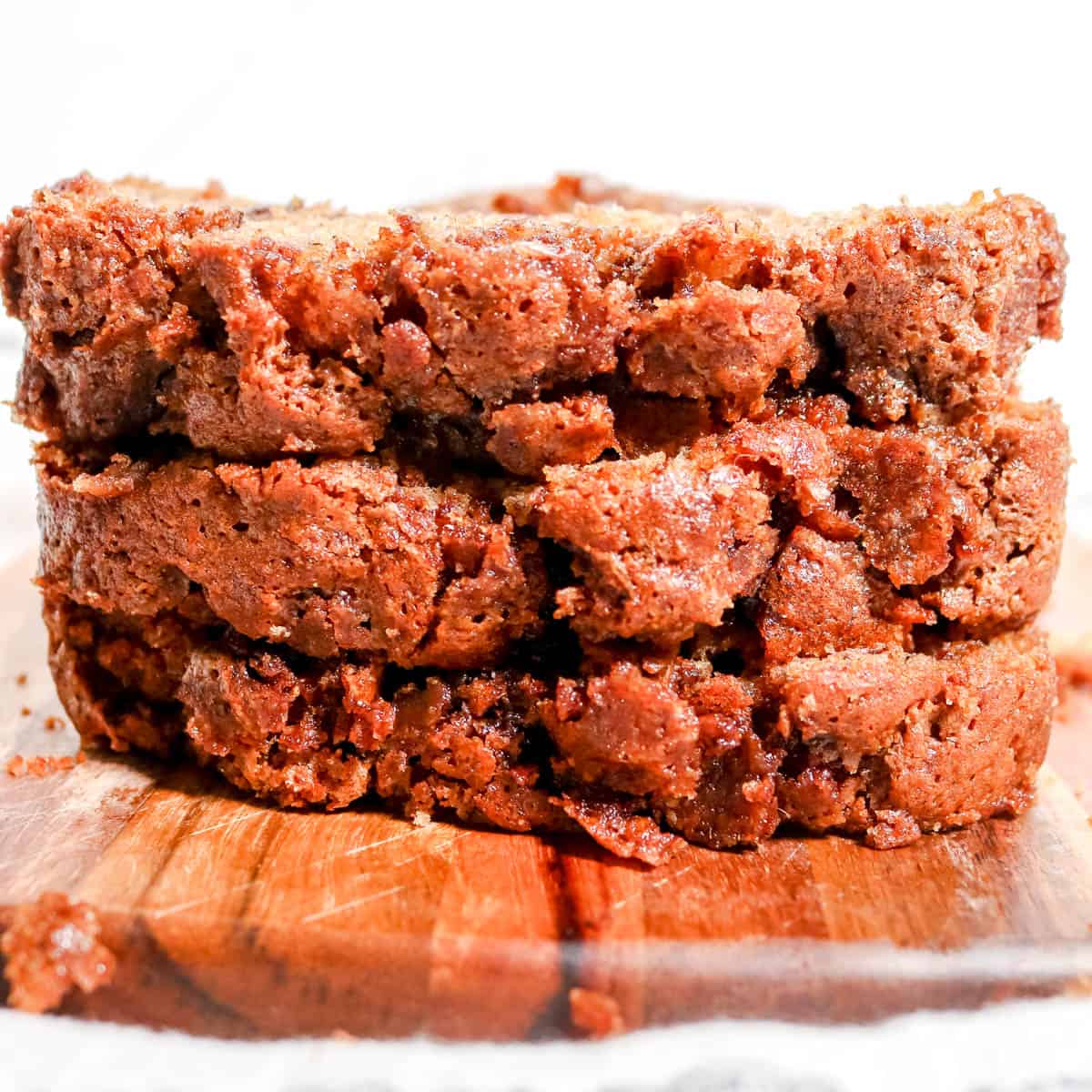 Stack of slices of chai chip banana bread.