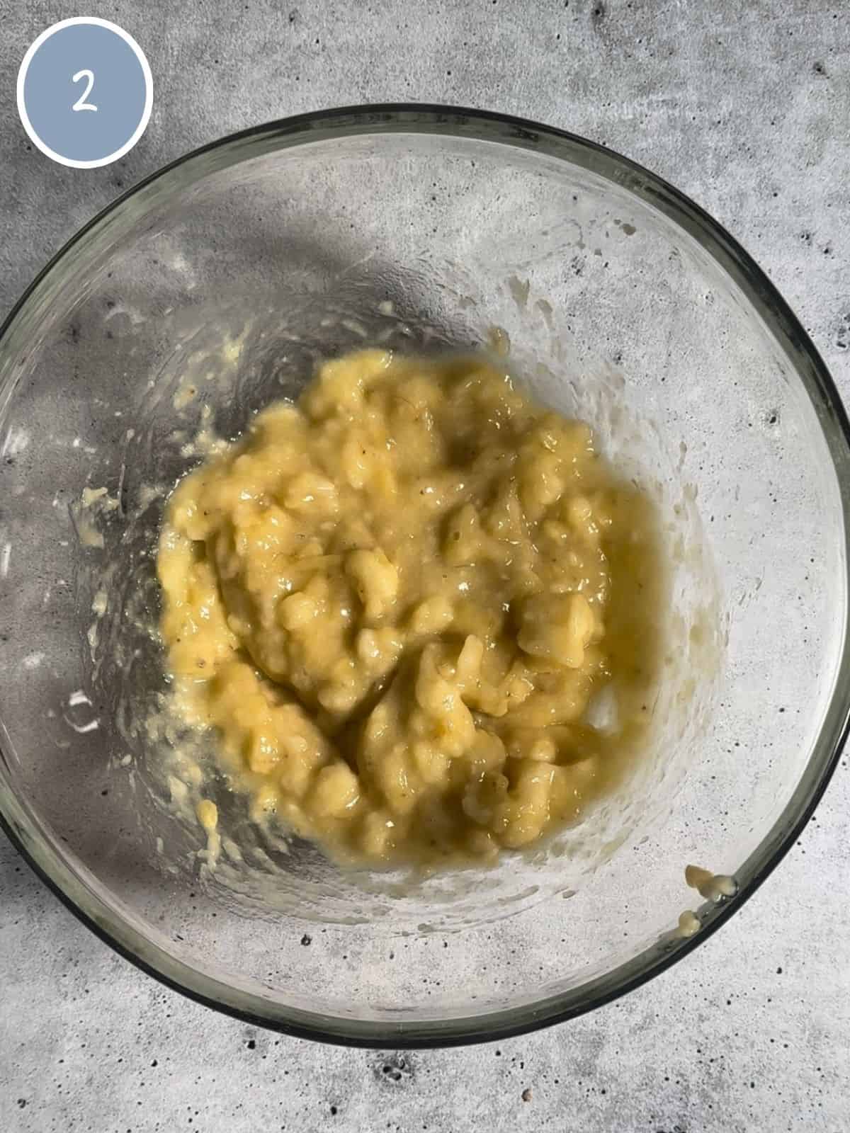 Mashed bananas in a bowl.