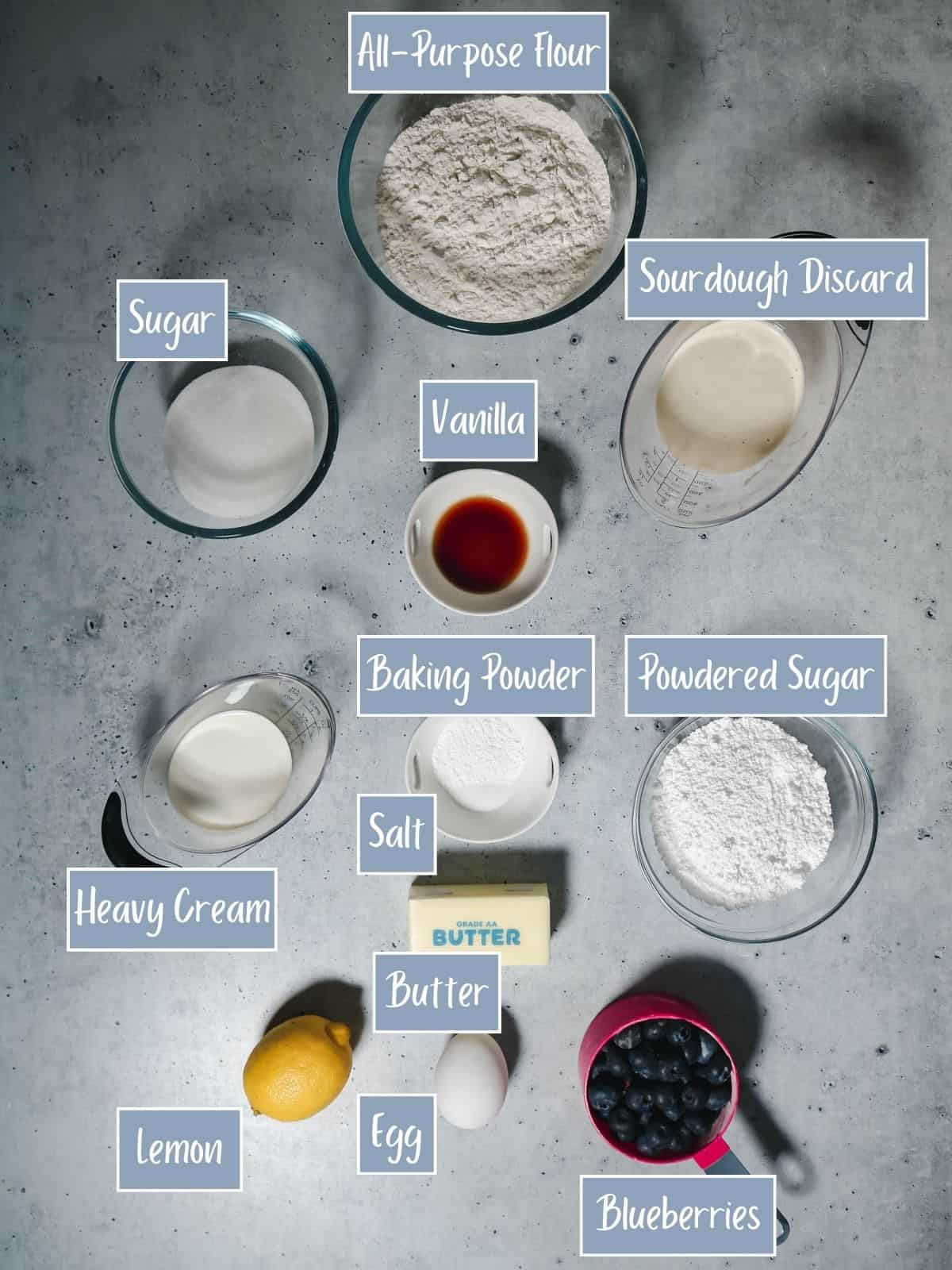 Labeled ingredients for making sourdough blueberry scones.