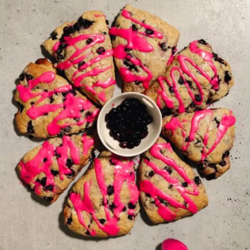 Baked and frosted huckleberry scones.