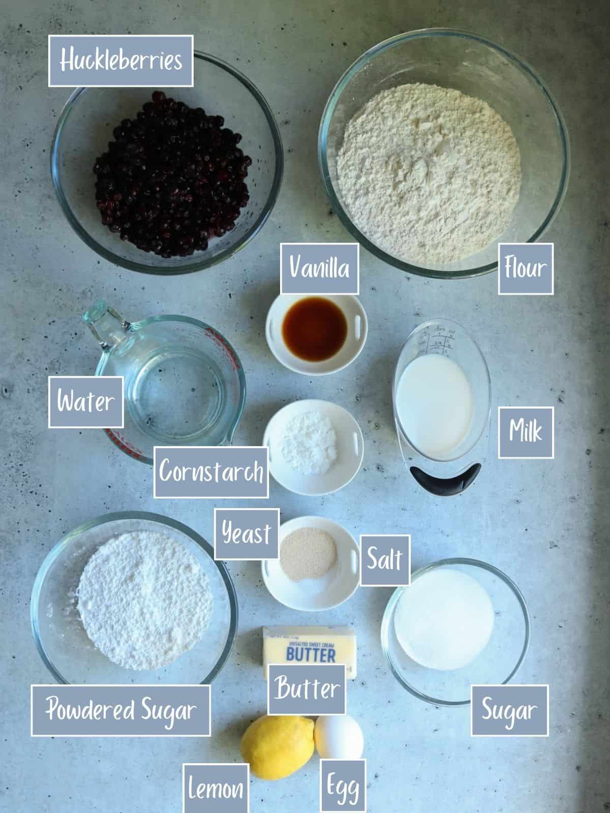 Labeled ingredients to make huckleberry sweet rolls.