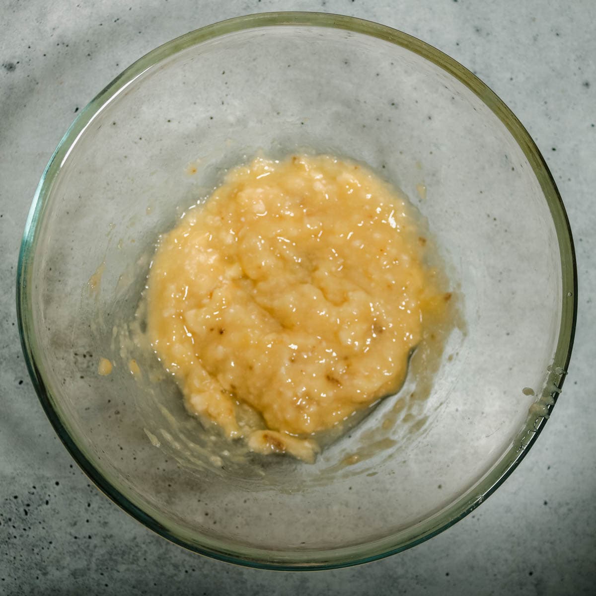 Mashed bananas in a bowl.