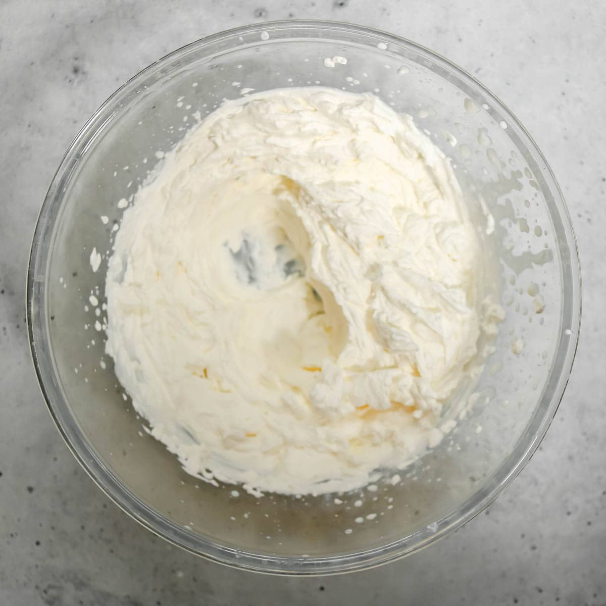 Heavy cream whipped to stiff peaks.