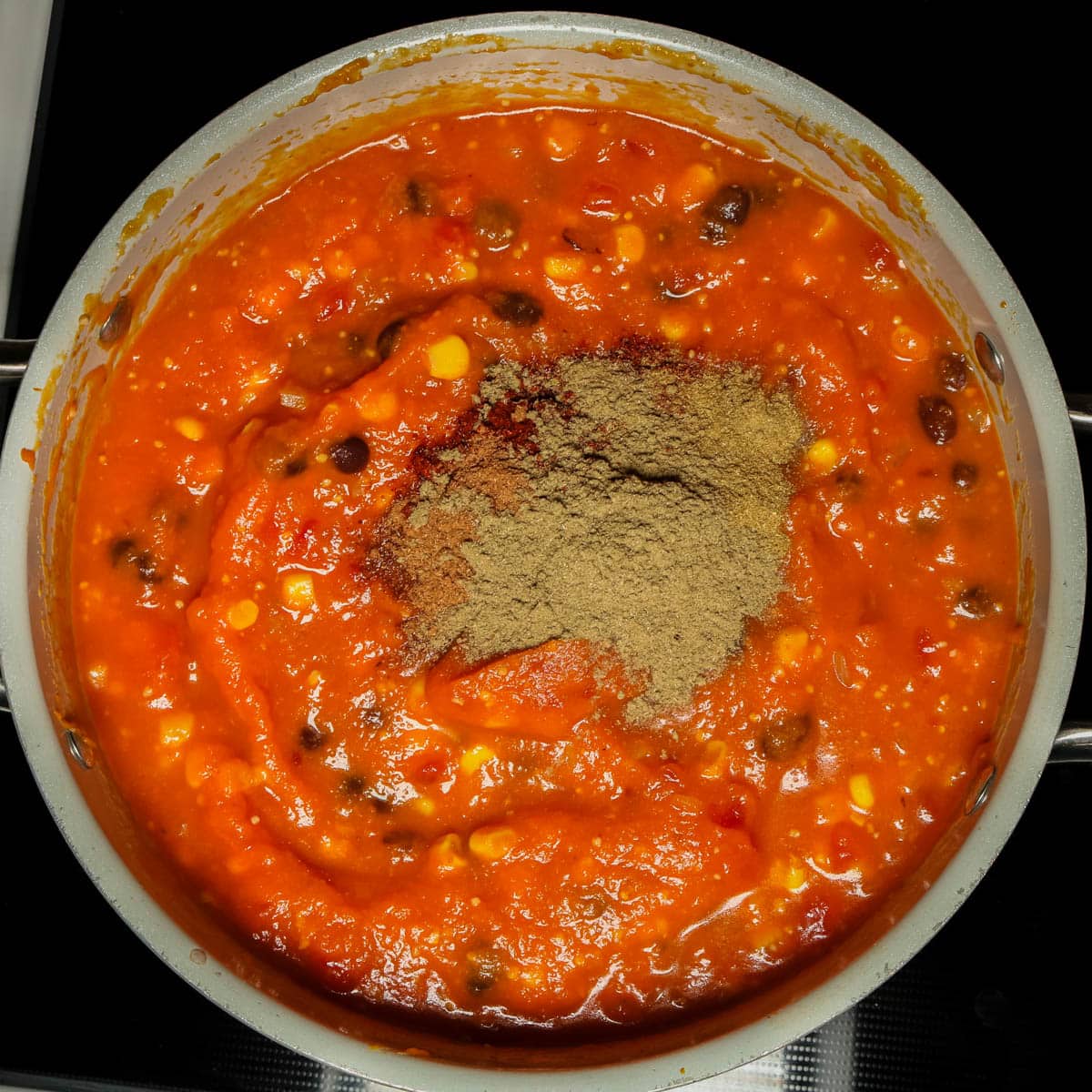 Spices added to the pumpkin chorizo soup.