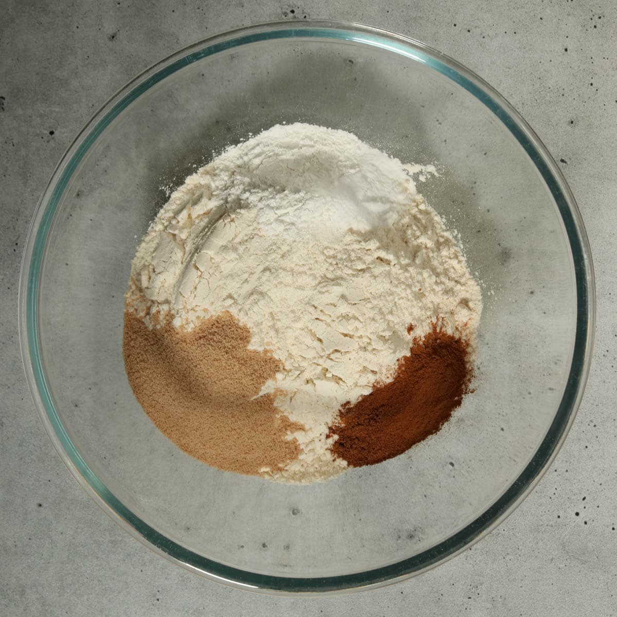 Dry ingredients for brown butter apple cider cookies in a bowl before mxing.