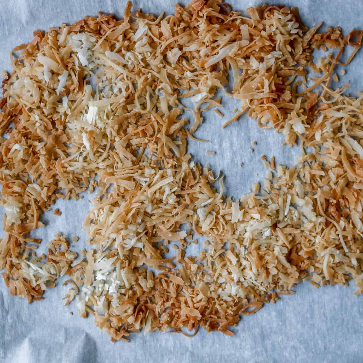 Toasted coconut on a cookie sheet.